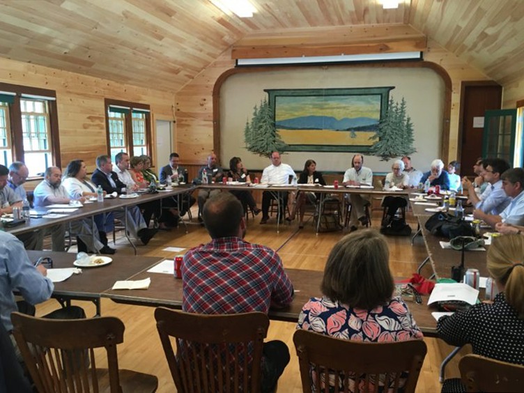 Nancy Smith/GrowSmart Maine State and community leaders take part in a roundtable discussion about broadband in Maine following a ribbon cutting on the Cranberry Isles in July.